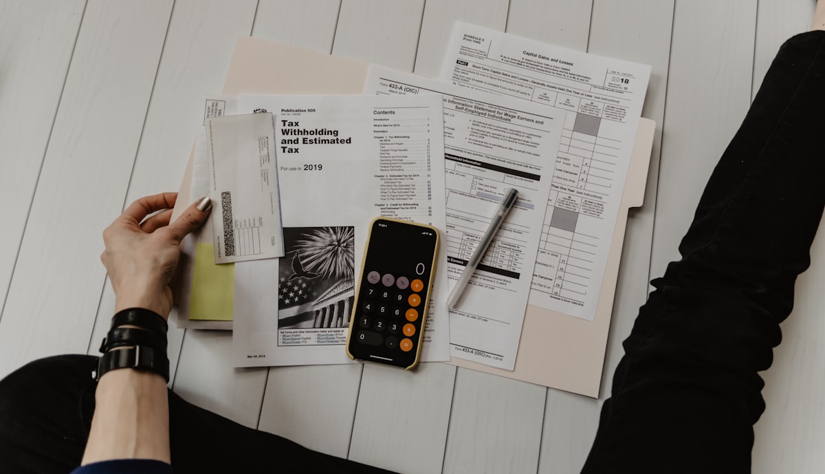 Financial analyst reviewing invoices and payment reports
